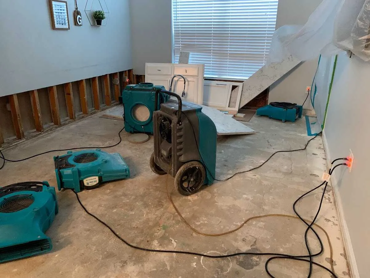 Dehumidifier in flood-cut room for Water Damage Restoration in Hudson